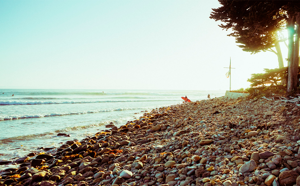 Surfers riding waves at Rincon, Santa Barbara